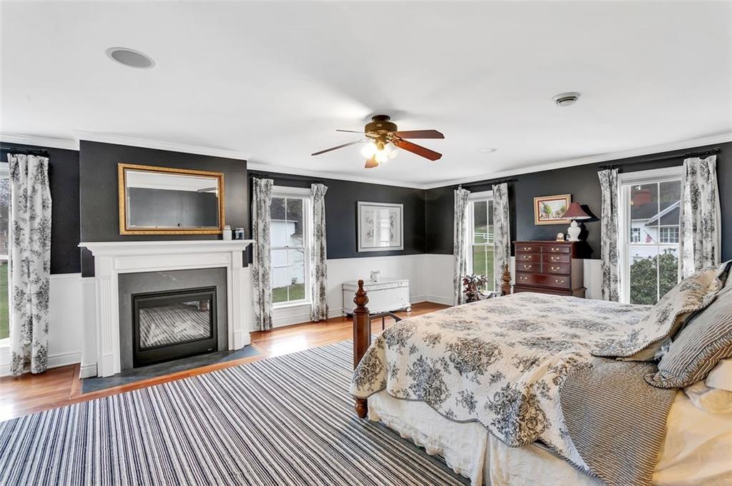 2333 Lesnett Road Pittsburgh, PA 15241 - Photo 11 of 25 a bed room with furniture and a fireplace