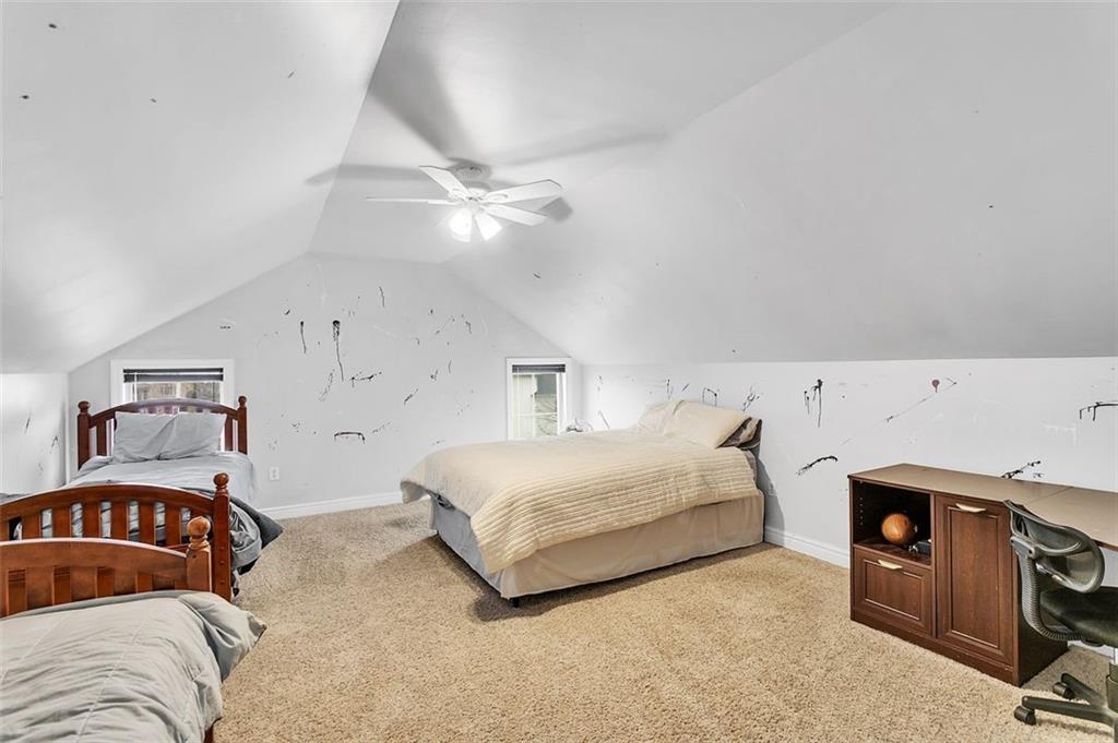 2333 Lesnett Road Pittsburgh, PA 15241 - Photo 17 of 25 a bedroom with a bed and a chandelier