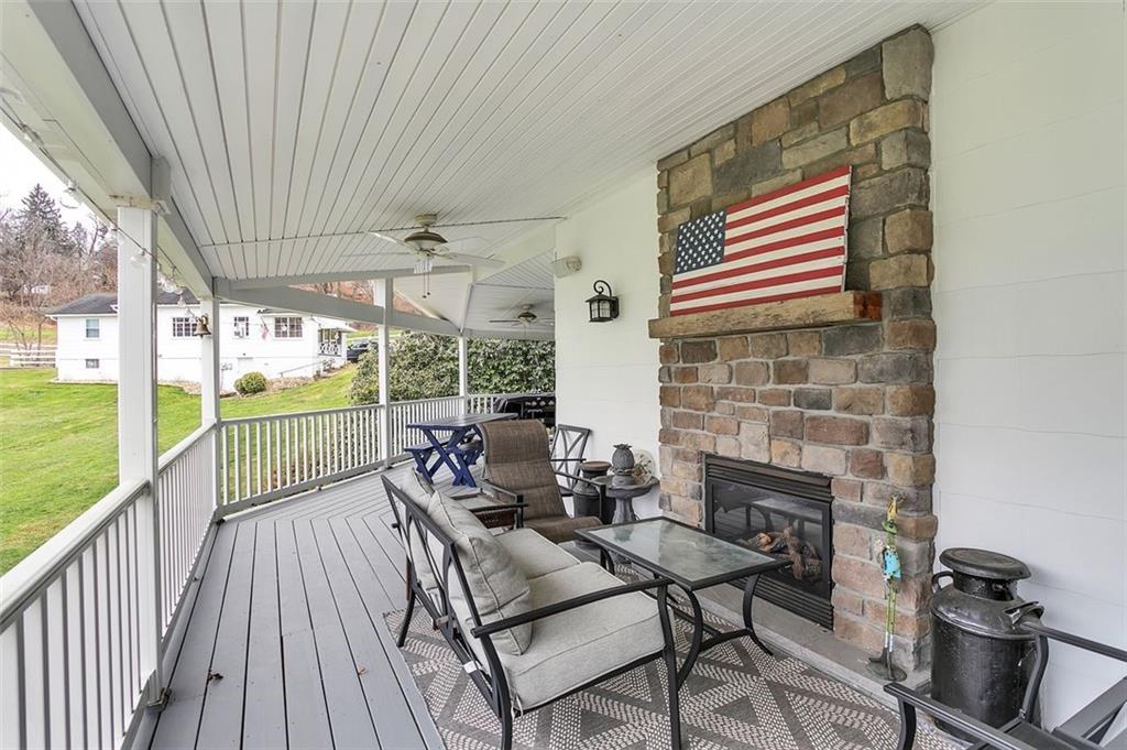 2333 Lesnett Road Pittsburgh, PA 15241 - Photo 21 of 25 a living room with furniture and a fireplace