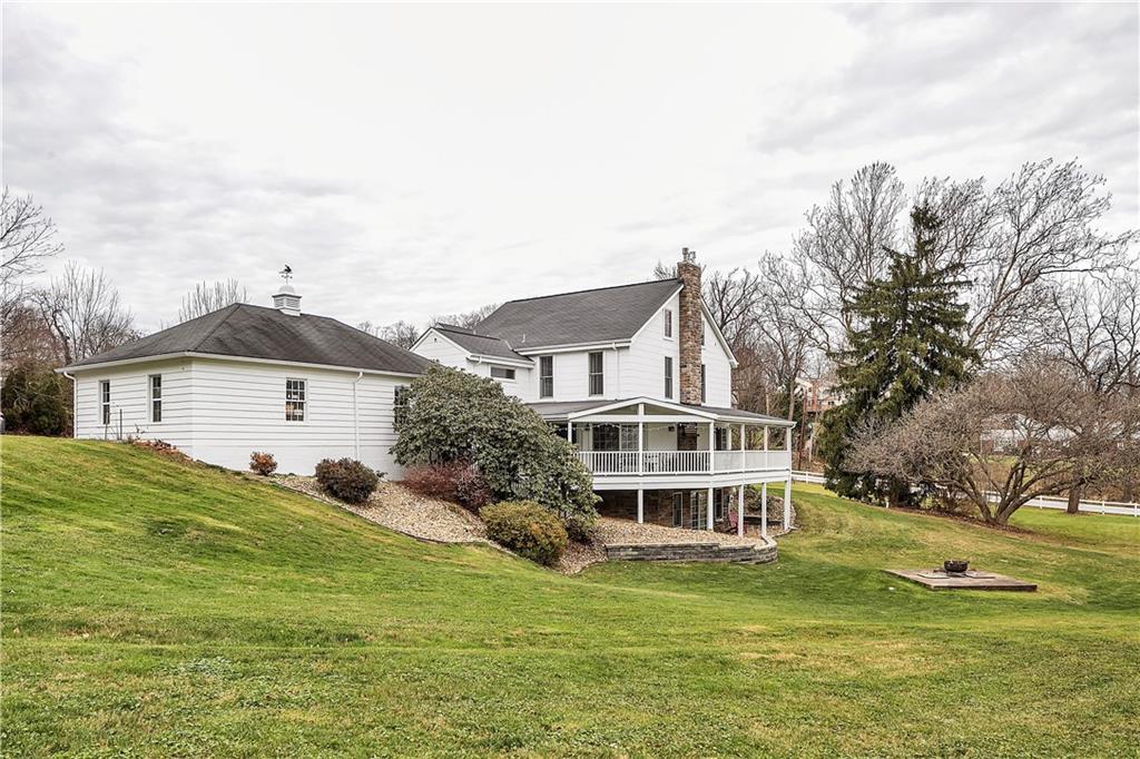 2333 Lesnett Road Pittsburgh, PA 15241 - Photo 23 of 25 a front view of a house with a yard