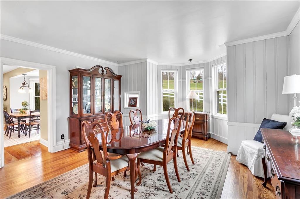2333 Lesnett Road Pittsburgh, PA 15241 - Photo 9 of 25 a view of a dining room with furniture window and wooden floor