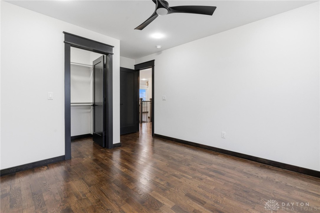 3509 South State Rte 72 Sabina, OH 45169 - Photo 34 of 44 This bright space features rich wood flooring, a ceiling fan, and convenient closet access.