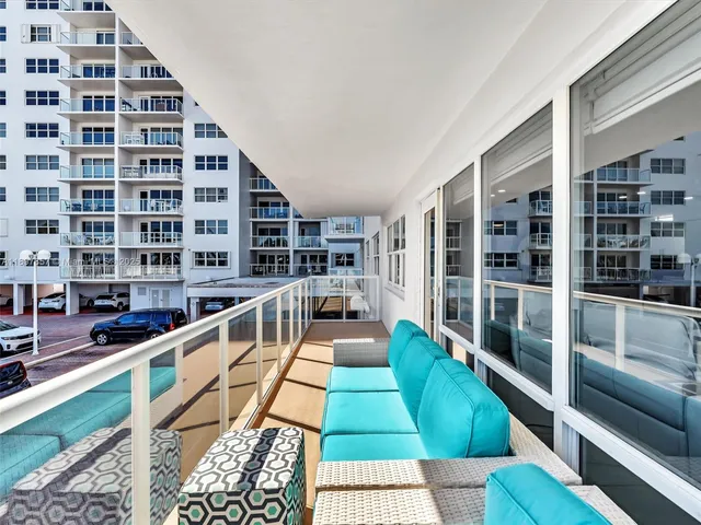 a large white building with glass door