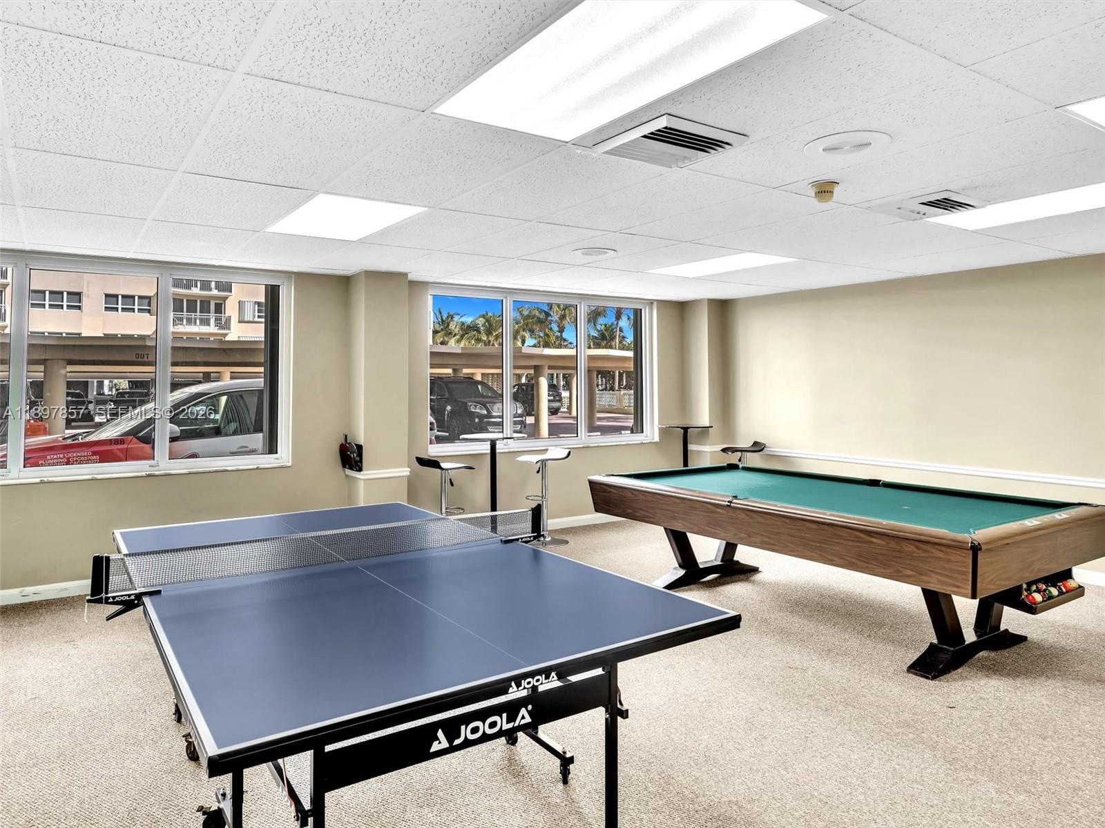 111 North Pompano Beach Boulevard, Unit 308 Pompano Beach, FL 33062 - Photo 38 of 50 a room with furniture pool table and windows