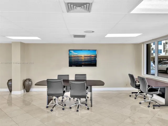 a view of street with palm trees
