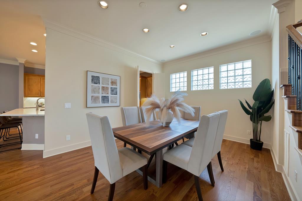 4010 Rawlins Street Dallas, TX 75219 - Photo 3 of 40 Dining room with ornamental molding, dark wood finished floors, and recessed lighting