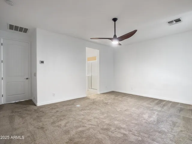 a bathroom with a sink vanity tub and a mirror