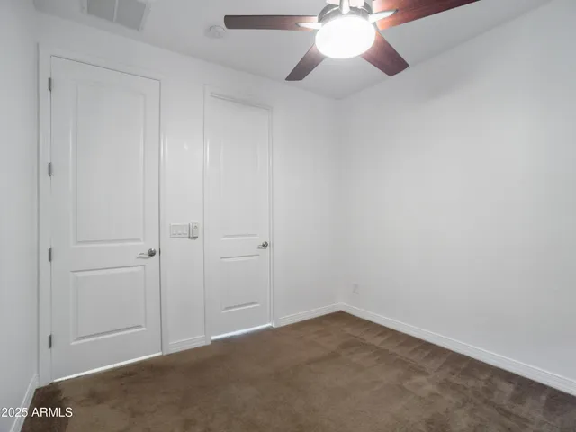 a bathroom with a sink toilet and vanity