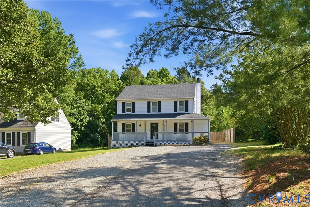 9110 Gayton Road Henrico, VA 23229 - Photo 38 of 54 a front view of a house with a yard