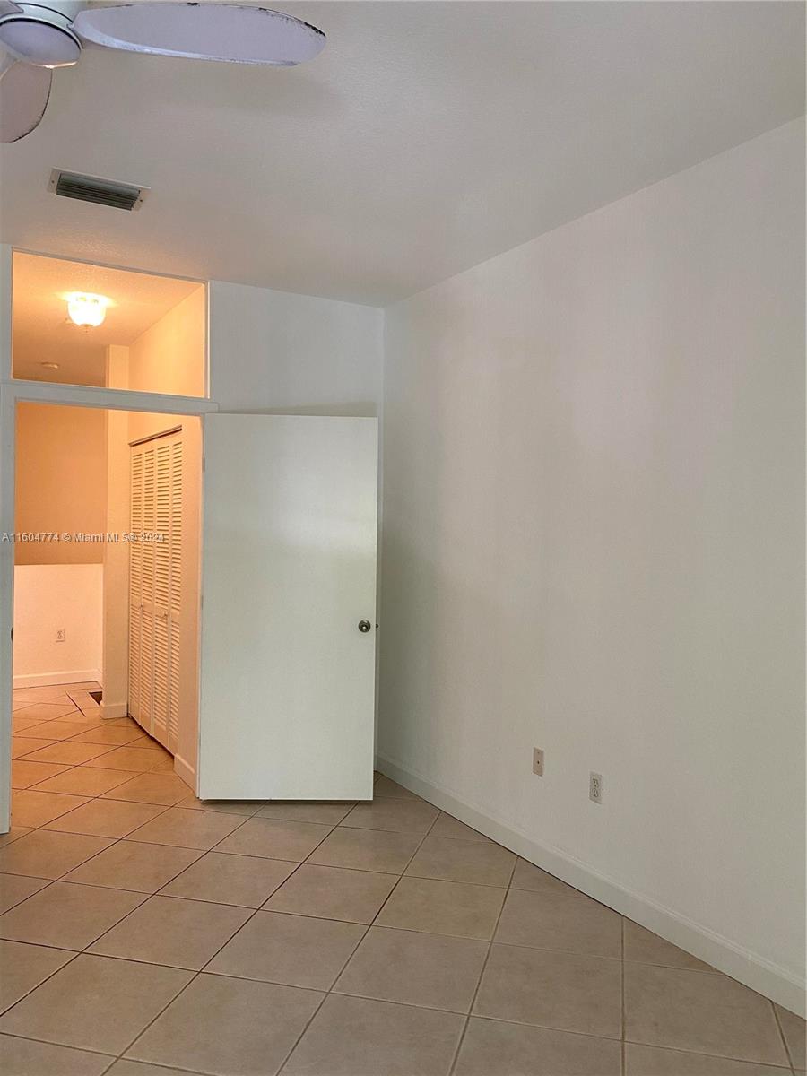 123 Southwest 17th Road, Unit 103 Miami, FL 33129 - Photo 11 of 21 an empty room with windows