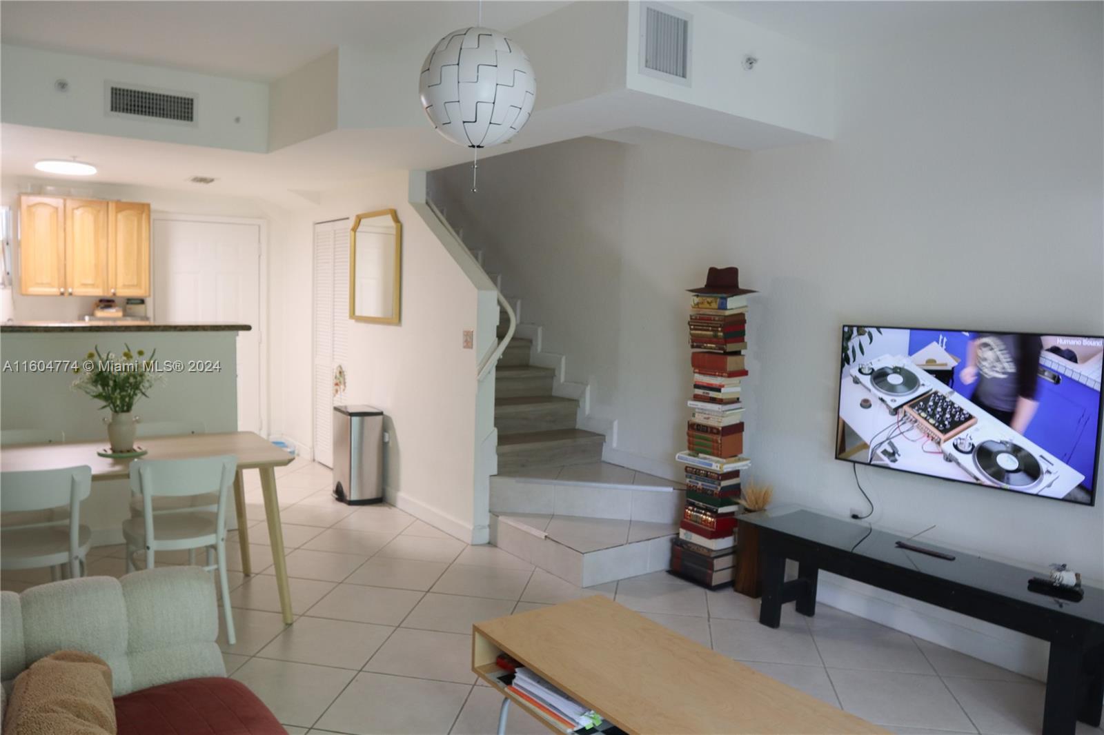 123 Southwest 17th Road, Unit 103 Miami, FL 33129 - Photo 8 of 21 a view of a livingroom with furniture and window