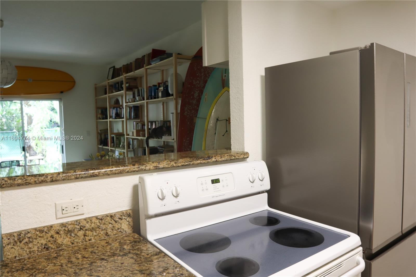 123 Southwest 17th Road, Unit 103 Miami, FL 33129 - Photo 9 of 21 a bathroom with a sink and a washing machine