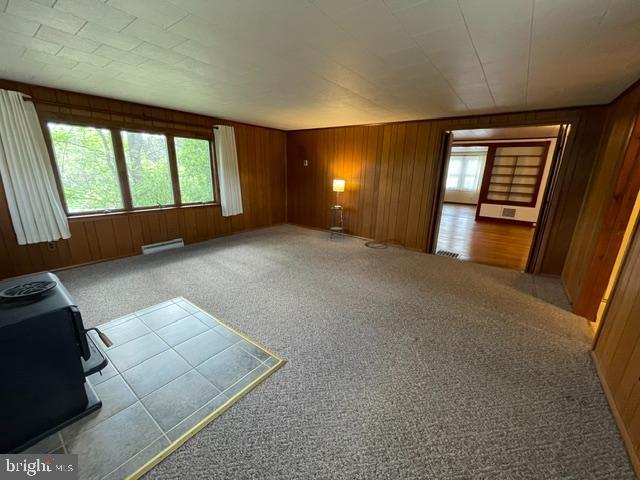 378 Tea Creek Road Reedsville, PA 17084 - Photo 19 of 41 a view of an empty room with a fireplace and a window
