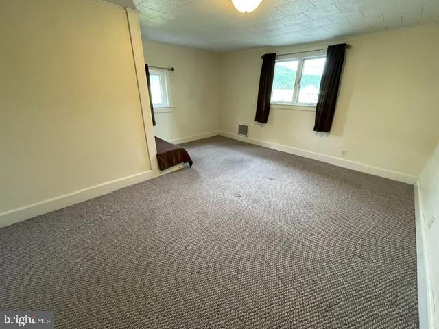 378 Tea Creek Road Reedsville, PA 17084 - Photo 24 of 41 an empty room with mirror and windows