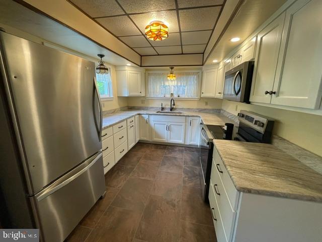 378 Tea Creek Road Reedsville, PA 17084 - Photo 3 of 41 a kitchen with granite countertop a refrigerator and a sink