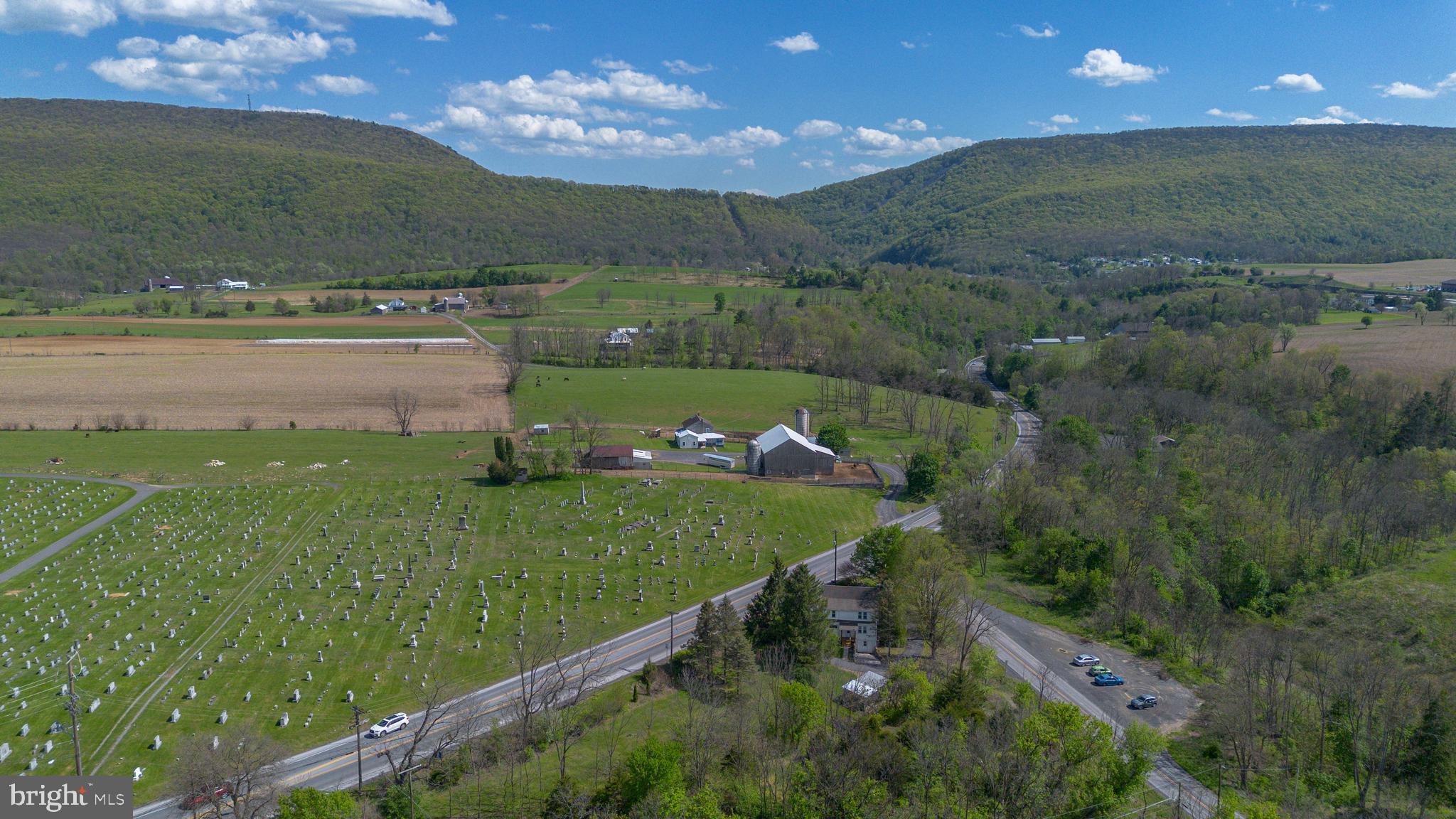 378 Tea Creek Road Reedsville, PA 17084 - Photo 39 of 41 a view of a golf course with a lake