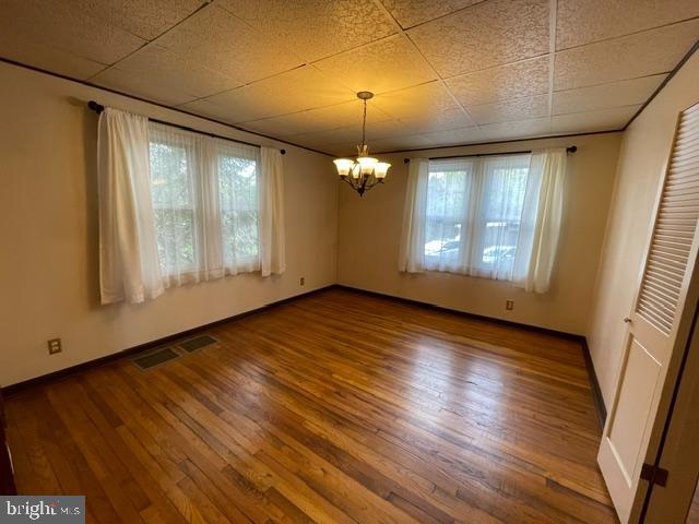 378 Tea Creek Road Reedsville, PA 17084 - Photo 10 of 41 an empty room with wooden floor and windows