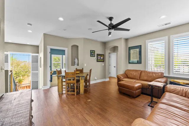 a view of a garden with a building in the background