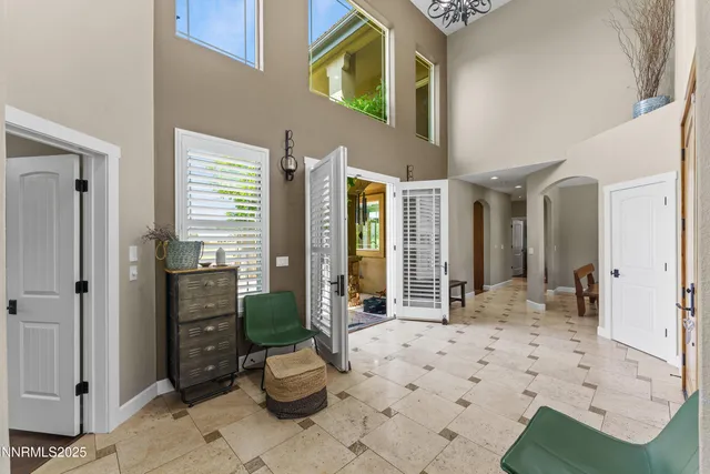 a kitchen with granite countertop a stove oven and a sink