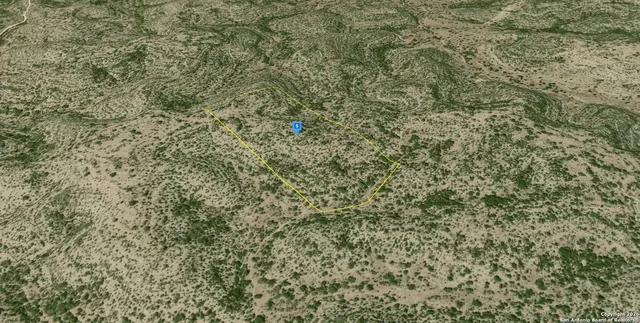 a view of a wooden fence