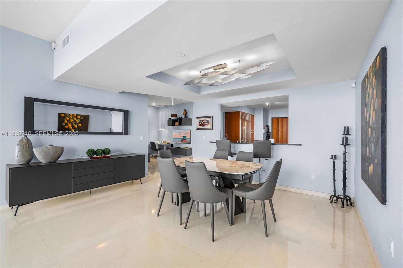 1331 Brickell Bay Drive, Unit 2909 Miami, FL 33131 - Photo 17 of 48 a view of a dining room with furniture