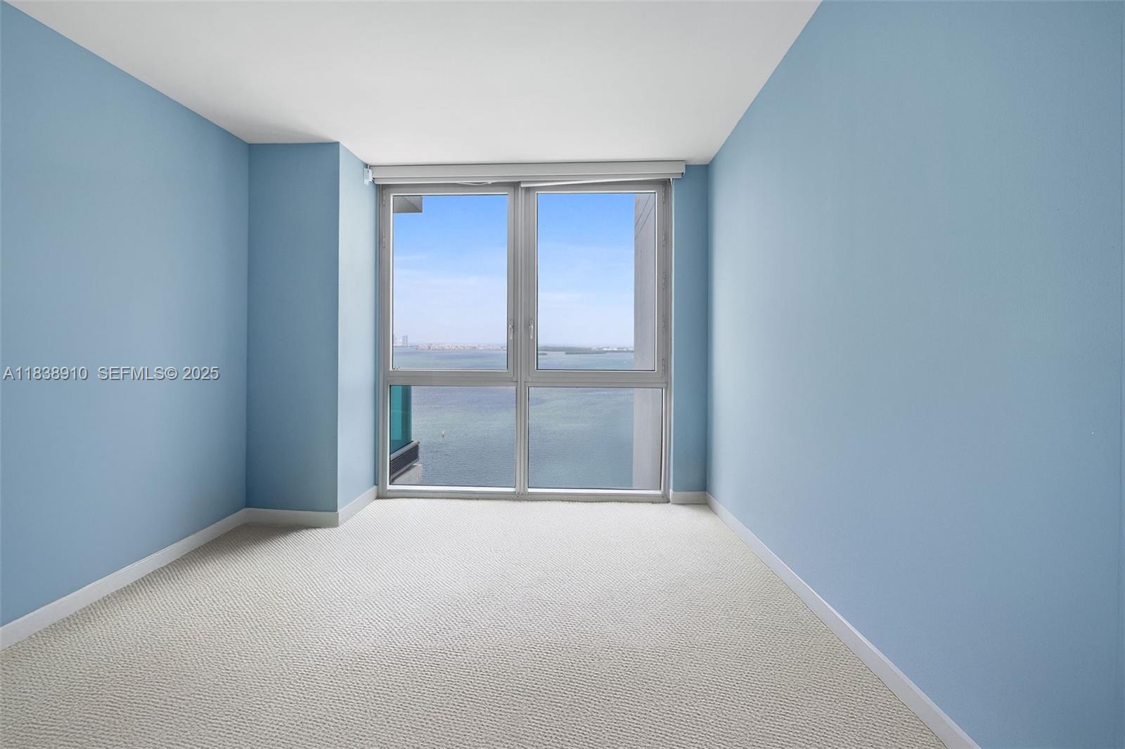 1331 Brickell Bay Drive, Unit 2909 Miami, FL 33131 - Photo 27 of 48 a view of an empty room with a window