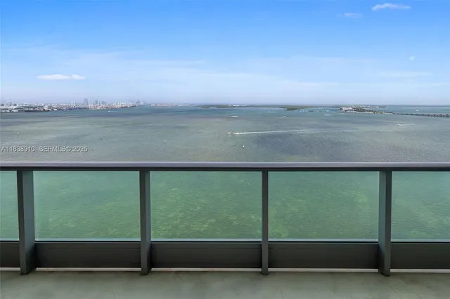 a view of a lake from a balcony