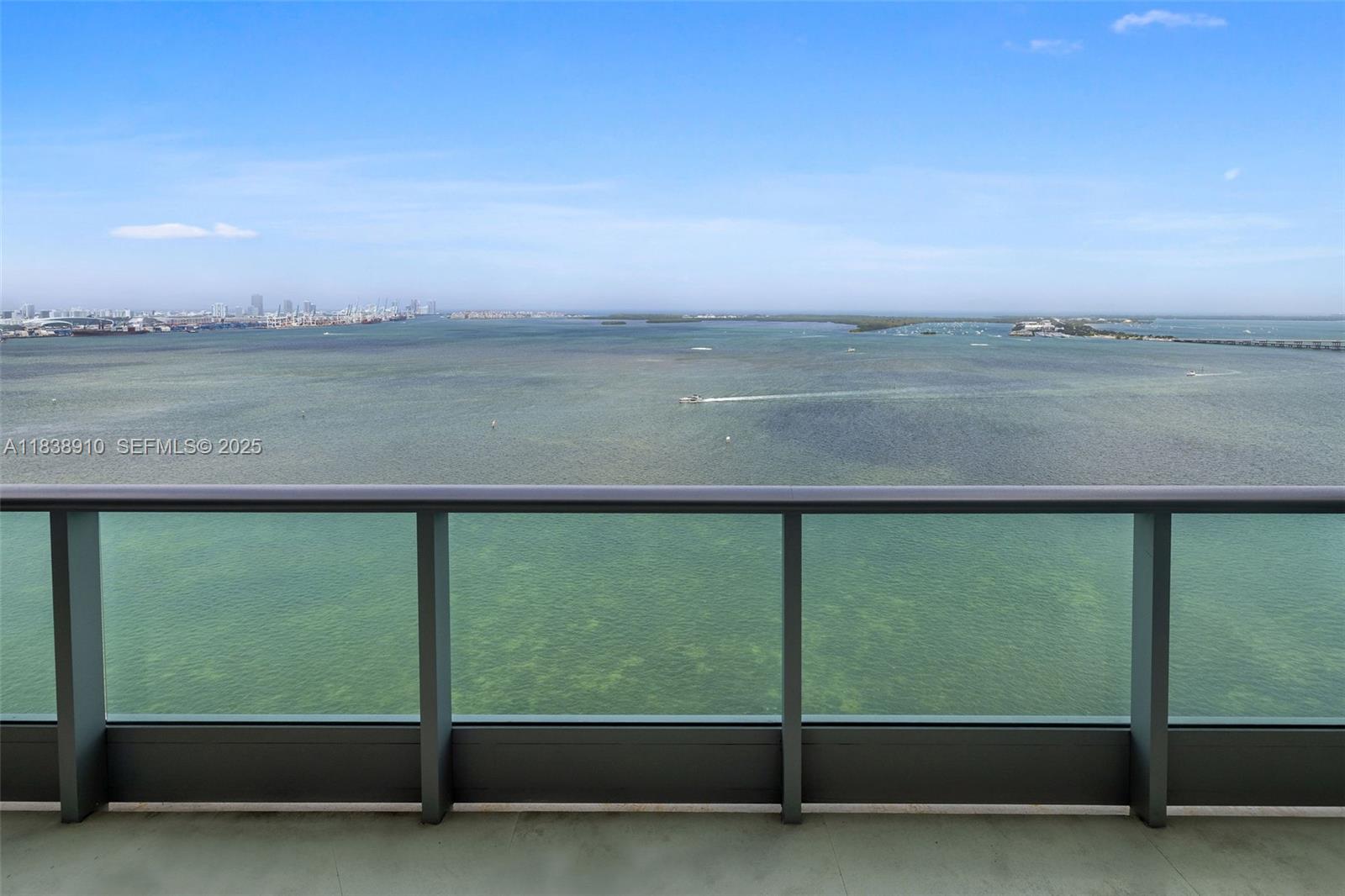 1331 Brickell Bay Drive, Unit 2909 Miami, FL 33131 - Photo 32 of 48 a view of a lake from a balcony
