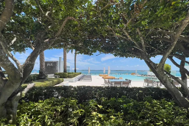 a view of a lake with a big yard