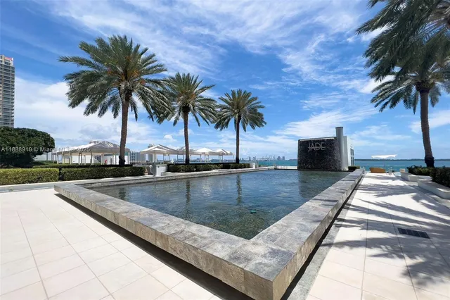 a view of a terrace with yard