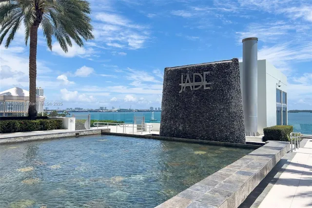 a view of an ocean with city from a terrace