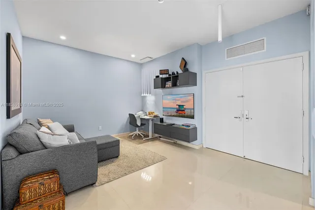 a living room with furniture and a couch