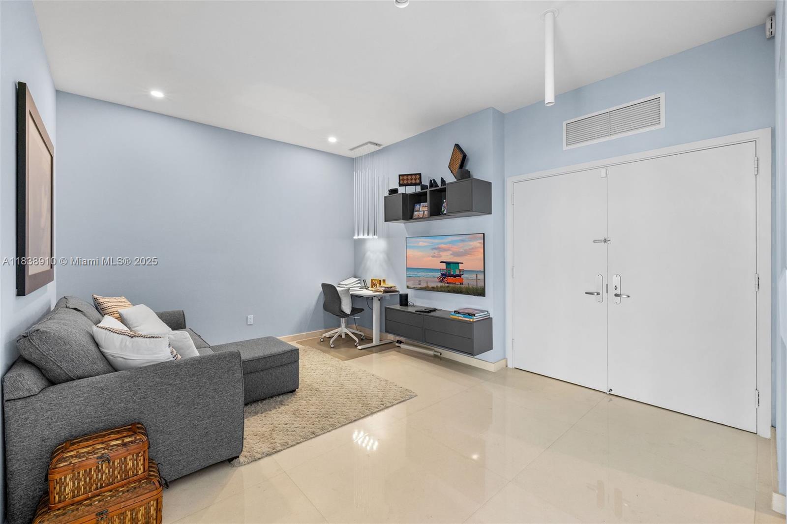 1331 Brickell Bay Drive, Unit 2909 Miami, FL 33131 - Photo 9 of 48 a living room with furniture and a couch