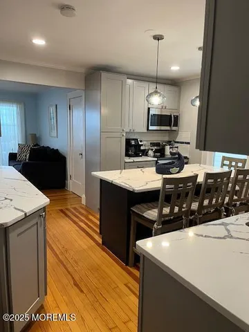 a kitchen with a stove and a sink