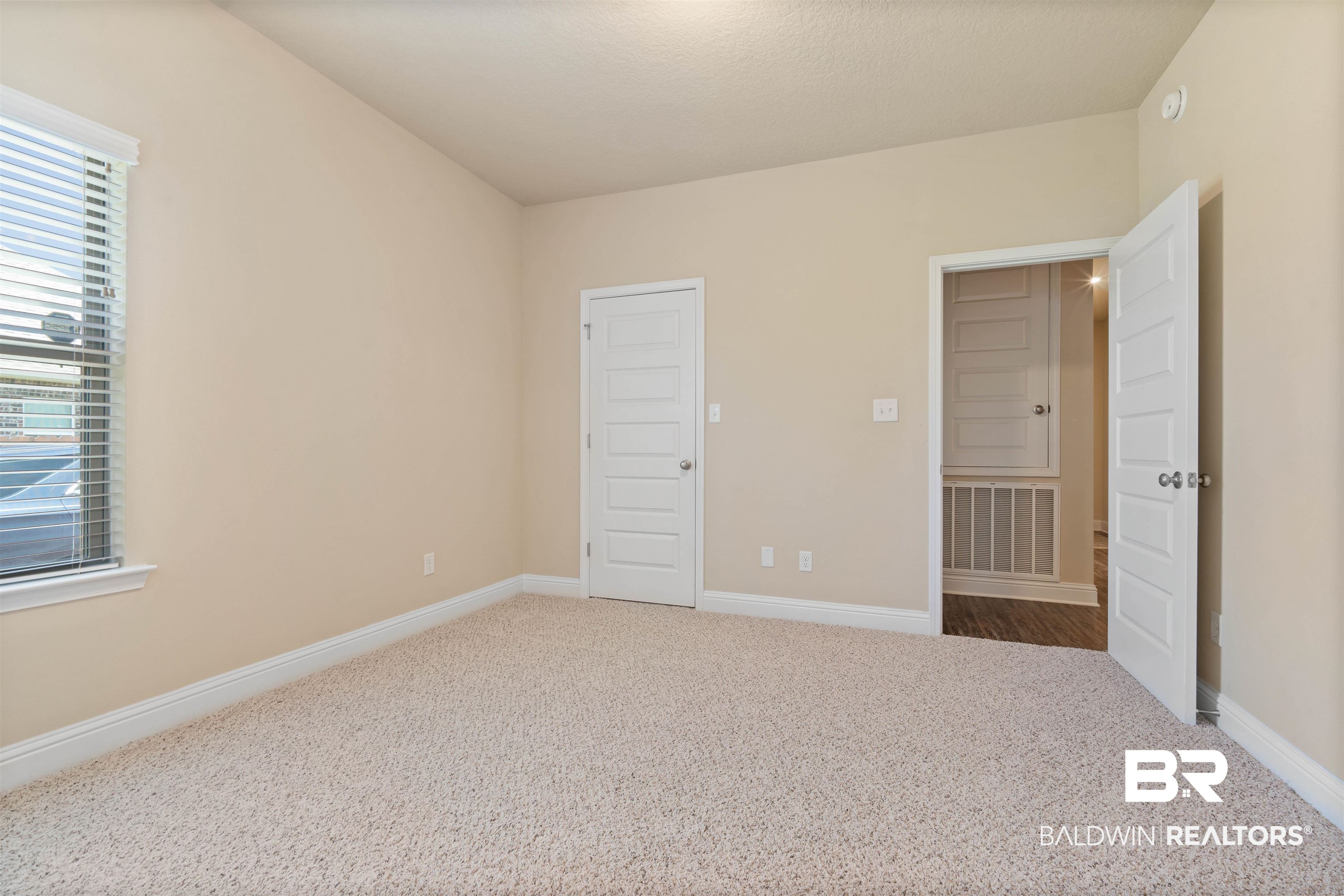 1864 Gwin Court Mobile, AL 36695 - Photo 26 of 37 Unfurnished bedroom featuring carpet