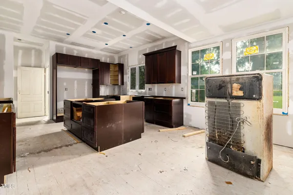 a kitchen with a stove and a sink