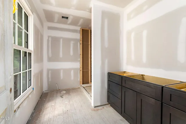 an empty room with windows