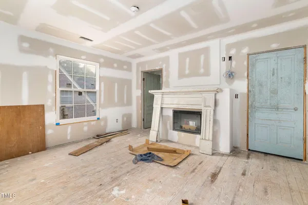 a room that has a sink and a table in it