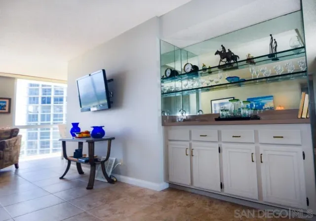a kitchen with stainless steel appliances granite countertop a sink and a cabinets