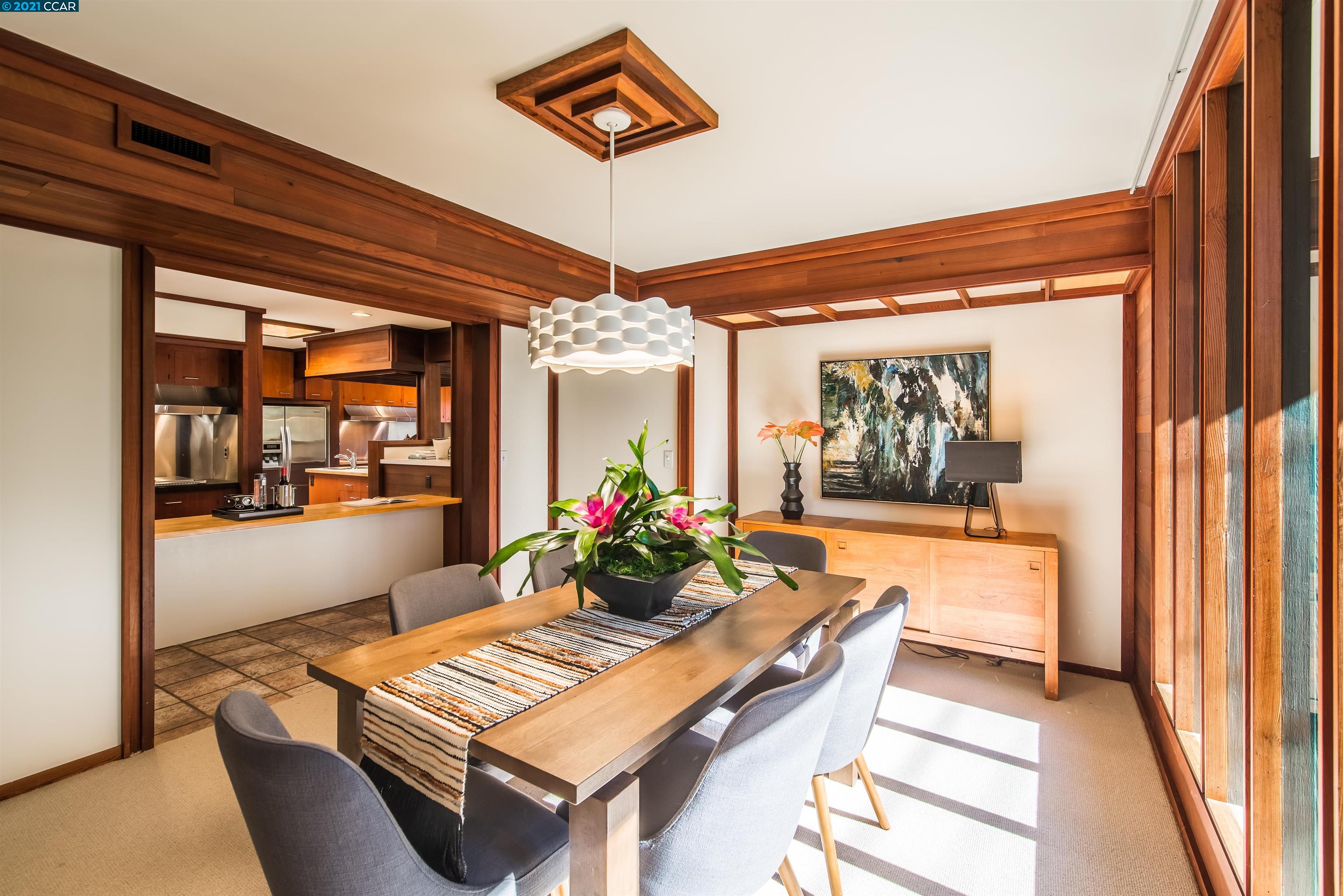 Pine Lane Lafayette, CA 94549 - Photo 13 of 39 a dining room with furniture and a potted plant