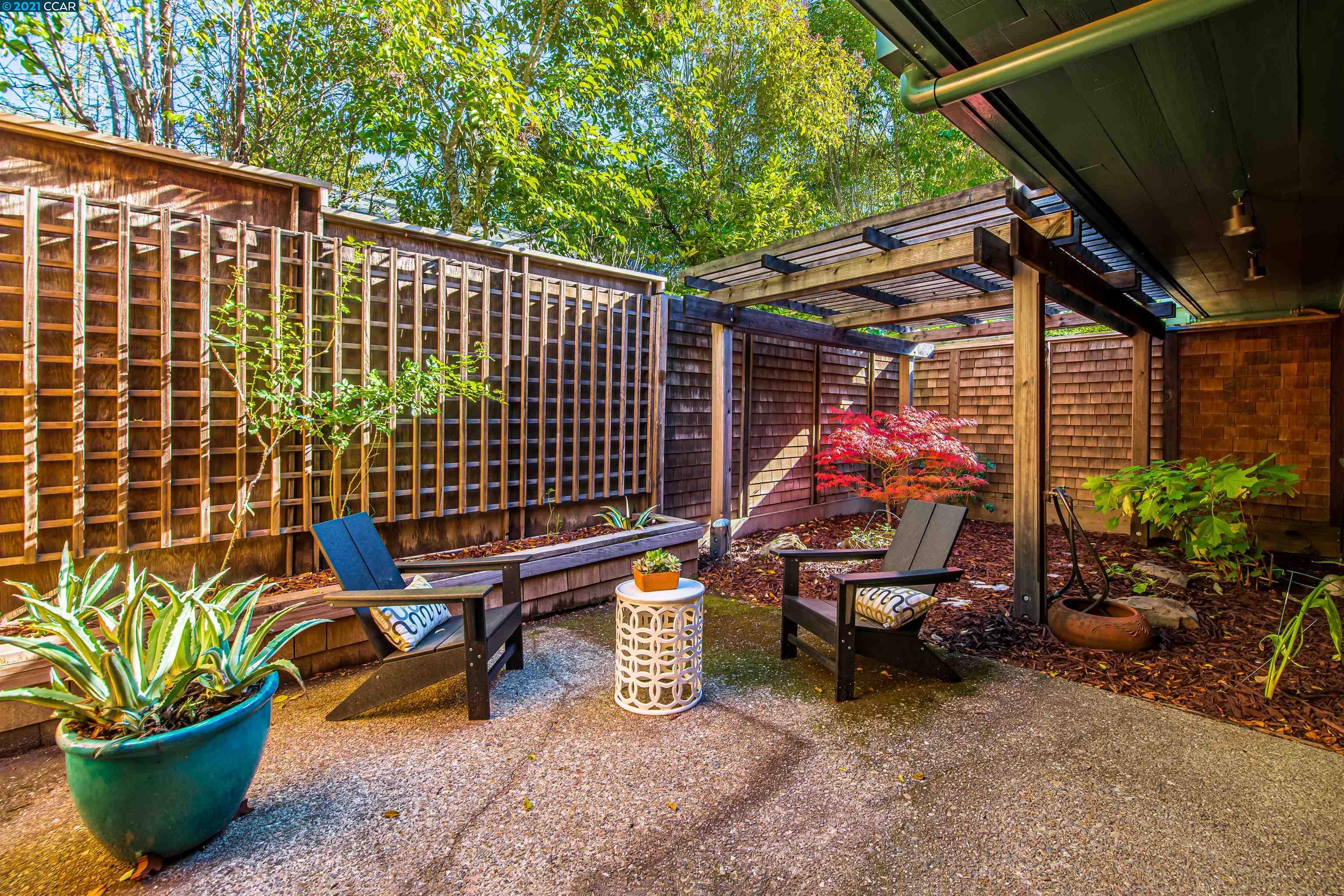 Pine Lane Lafayette, CA 94549 - Photo 21 of 39 a view of a patio with table and chairs potted plants