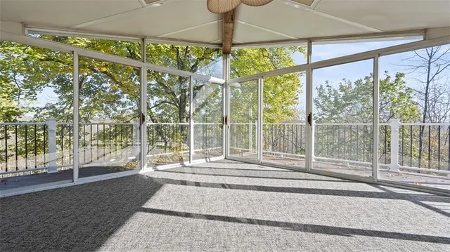 a living room filled with furniture and a table