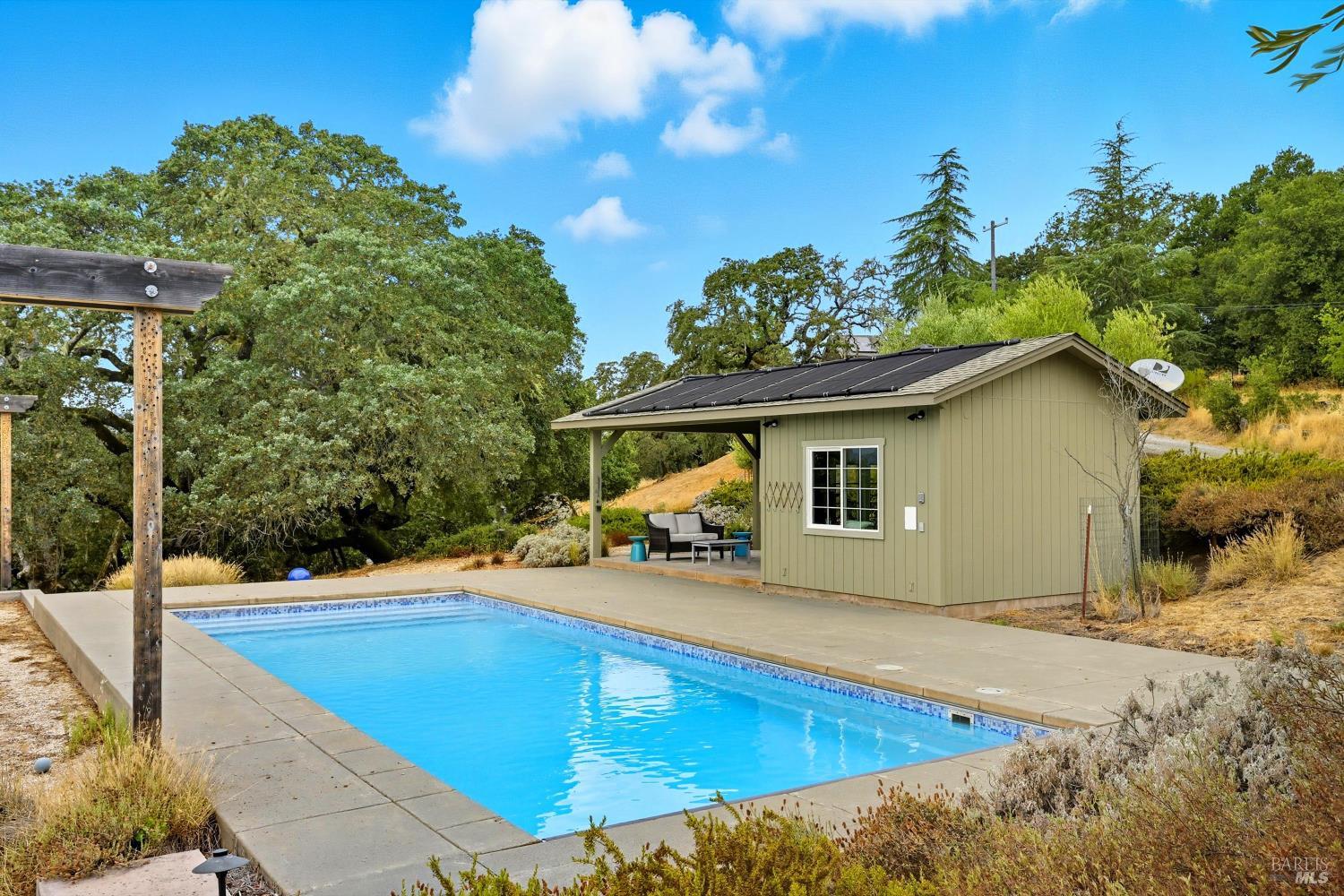 31000 Pine Mountain Road Cloverdale, CA 95425 - Photo 2 of 61 Resort-style heated pool surrounded by majestic oaks and panoramic Wine Country views.