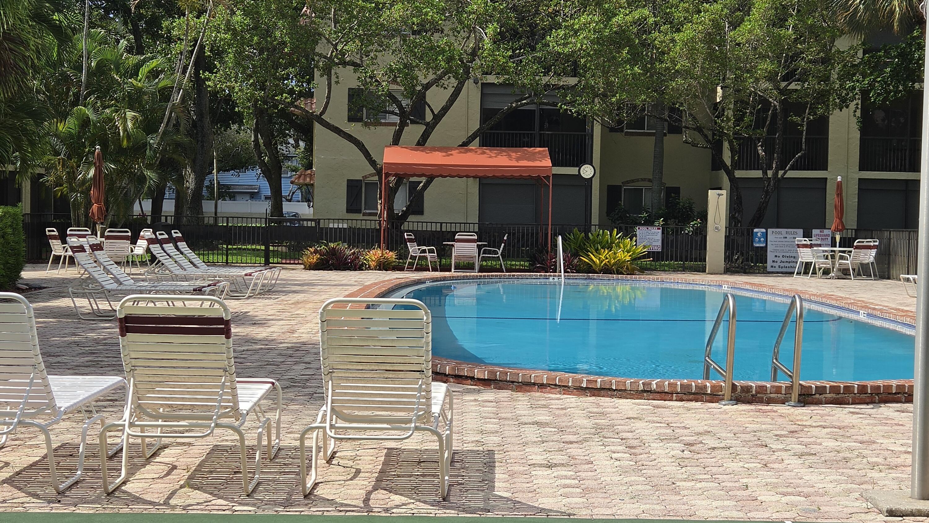 257 South Cypress Road, Unit 408 Pompano Beach, FL 33060 - Photo 15 of 19 Pool area