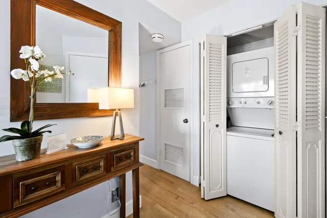 a kitchen with stainless steel appliances a refrigerator and a stove