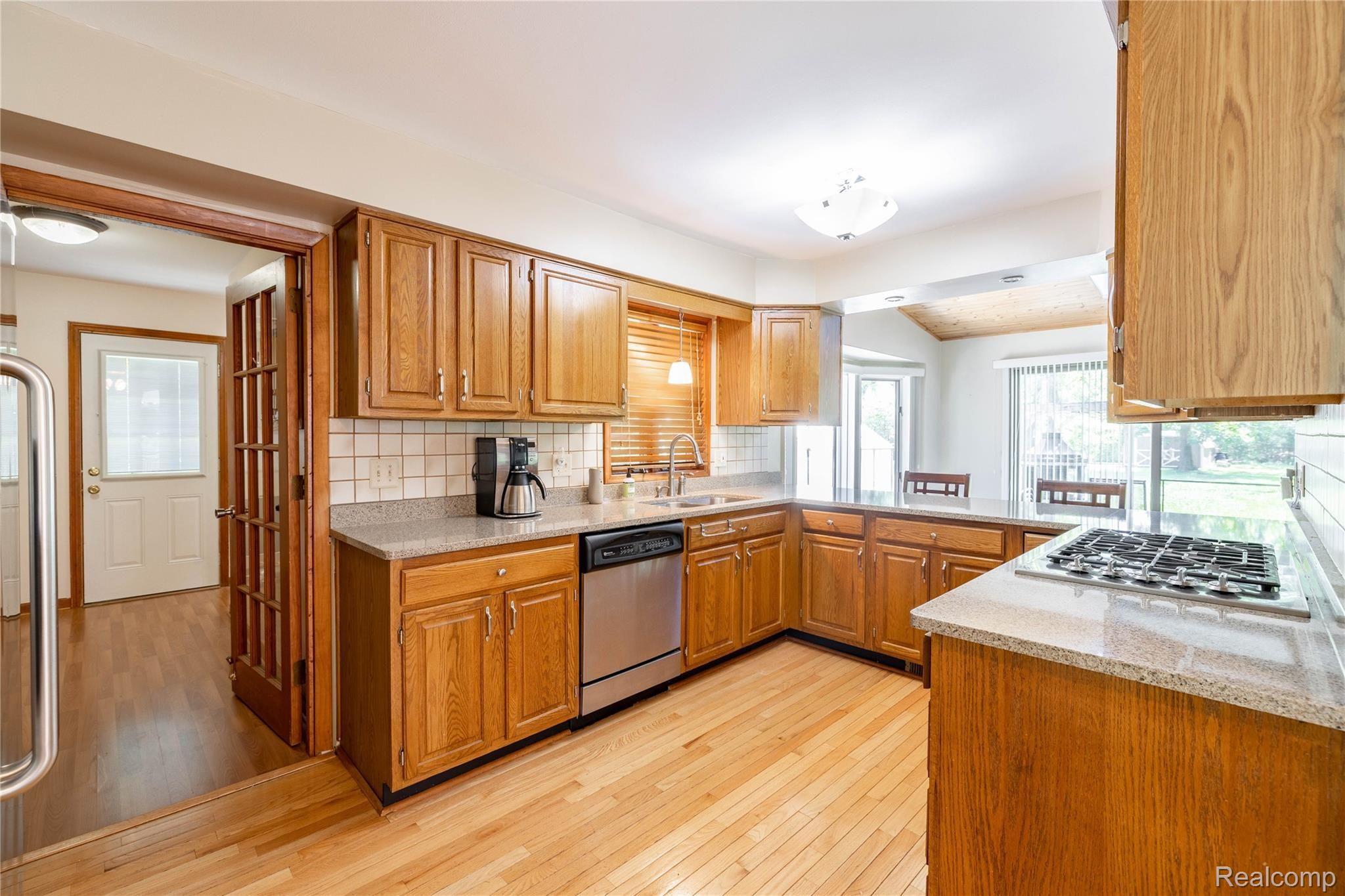 8653 Lake Road Grosse Ile, MI 48138 - Photo 10 of 34 8653 Lake Rd, Grosse Ile - Kitchen Open to Dining Space