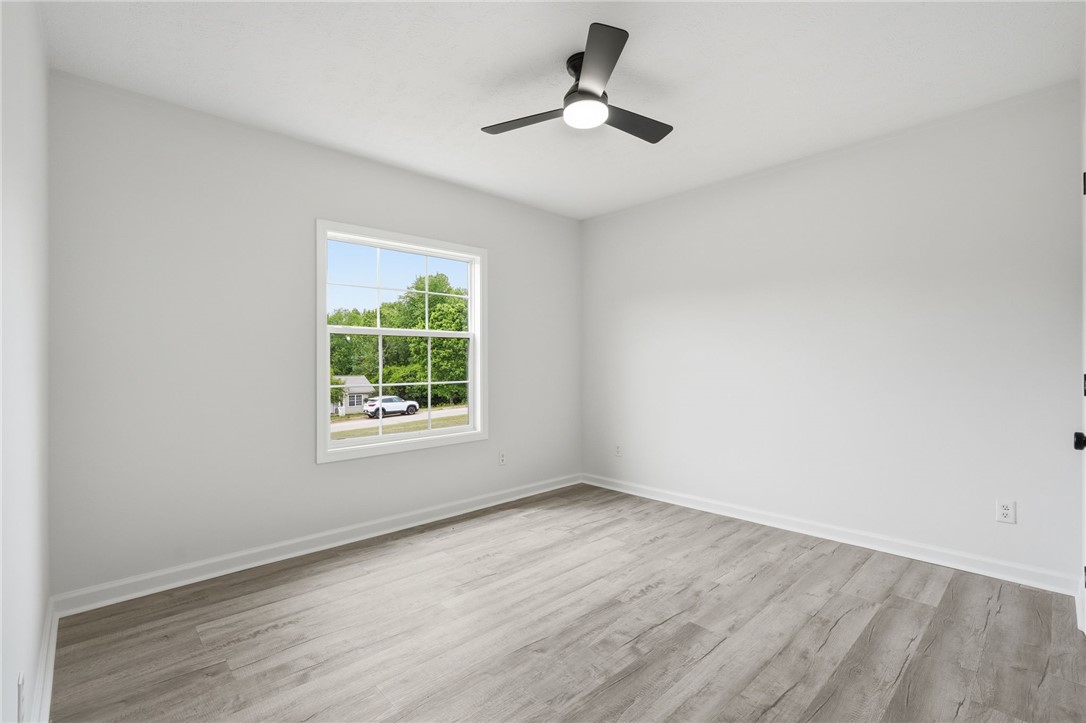 112 Sir Francis Drake Way Liberty, SC 29657 - Photo 23 of 42 This bright room features a large window, offering ample natural light and views of the surrounding landscape.
