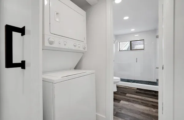a view of storage and utility room with washer and dryer