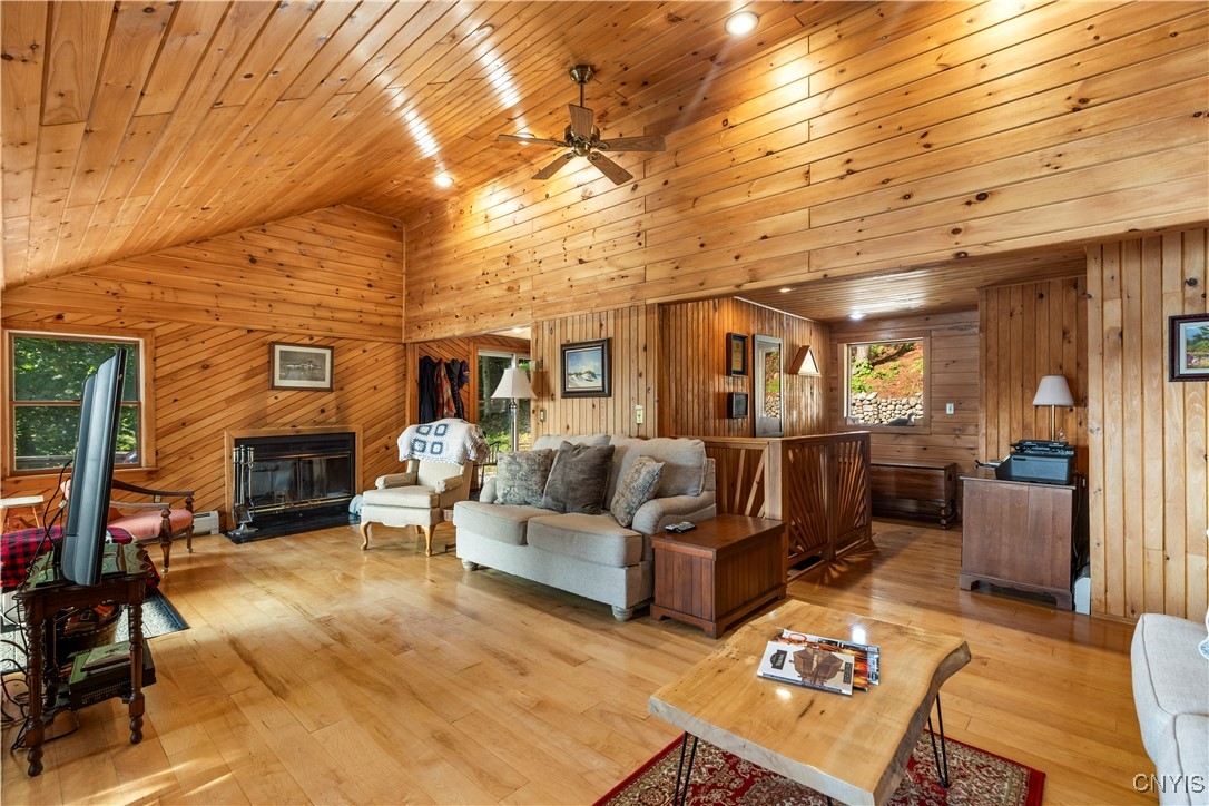 8119 Capron Road Forestport, NY 13494 - Photo 11 of 37 Living room cathedral ceiling