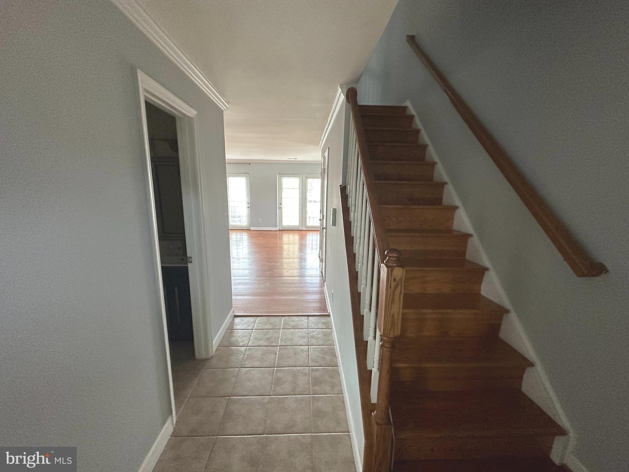 4033 Chesterwood Drive, Unit 4033 Silver Spring, MD 20906 - Photo 2 of 13 a view of entryway and gallery with wooden floor